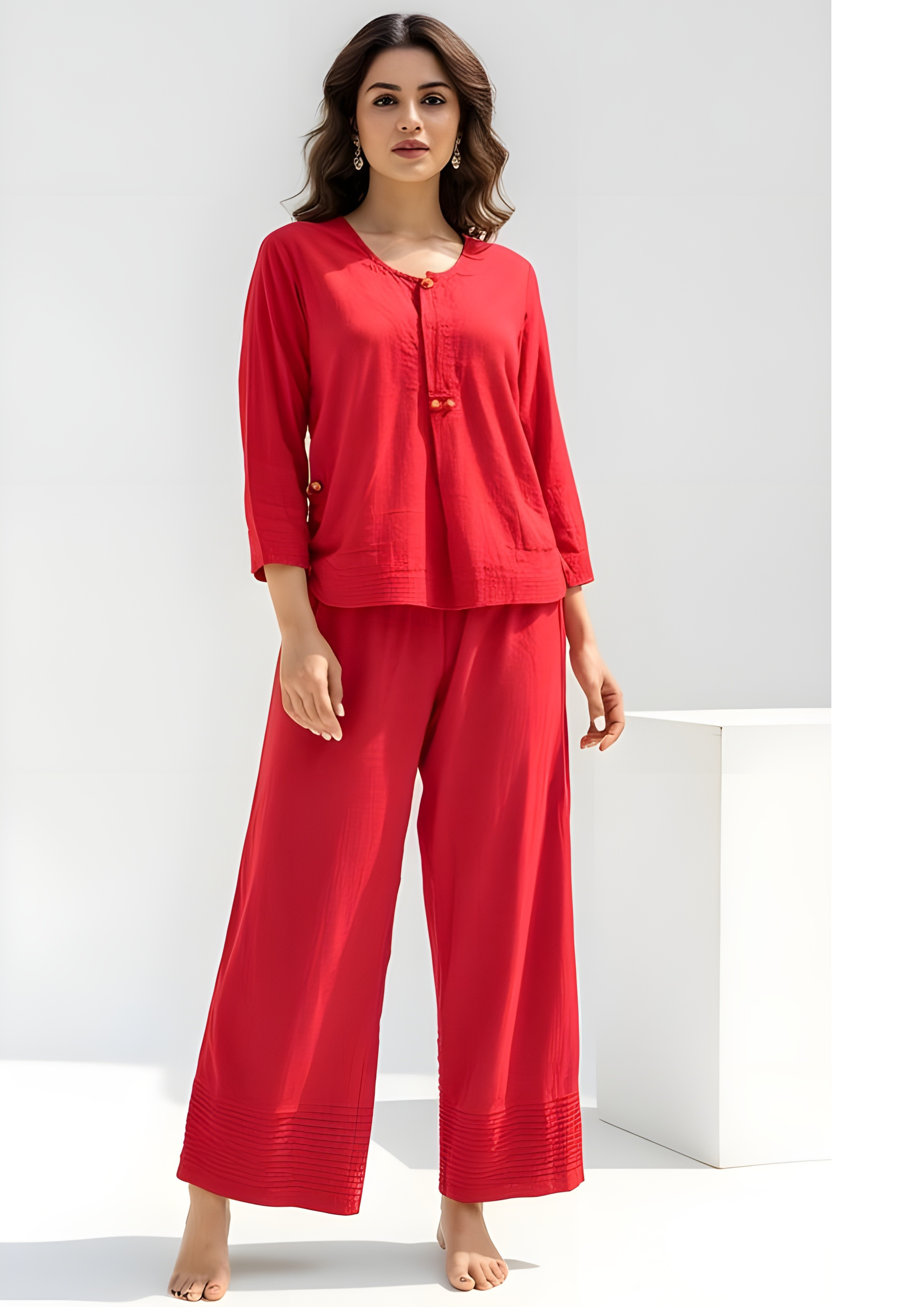 Model wearing red two-piece co-ord set, relaxed top women’s ethnic fusion wear- Indu Heritage.Soft, breathable fabric for all-day comfort.Relaxed fit for all-day wear.Side pockets for added functionality.Lightweight, breathable cotton fabric ideal for all seasons.Soft, breathable fabric for all-day comfort.Relaxed fit for all-day wear.Side pockets for added functionality.Lightweight, breathable cotton fabric ideal for all seasons.Elegant,Relaxed-fit top with subtle neckline detailing,Versatile outfit.