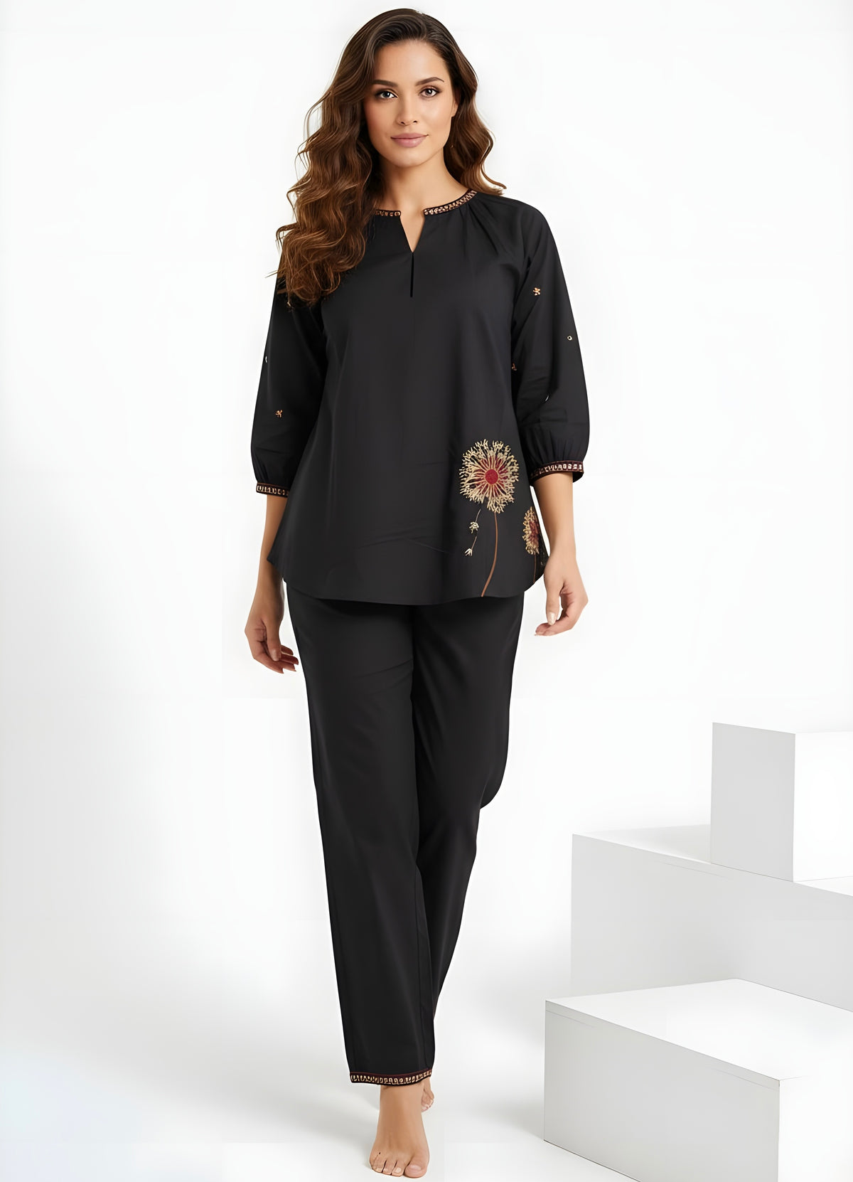 Model wearing black two-piece co-ord set with floral embroidery and relaxed top women’s ethnic fusion wear- Indu Heritage.Soft, breathable fabric for all-day comfort.Relaxed fit for all-day wear.Side pockets for added functionality.Lightweight, breathable cotton fabric ideal for all seasons
